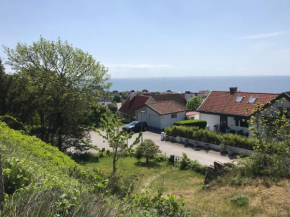Boende med fri utsikt över Mölle by hamn och Öresund, Mölle